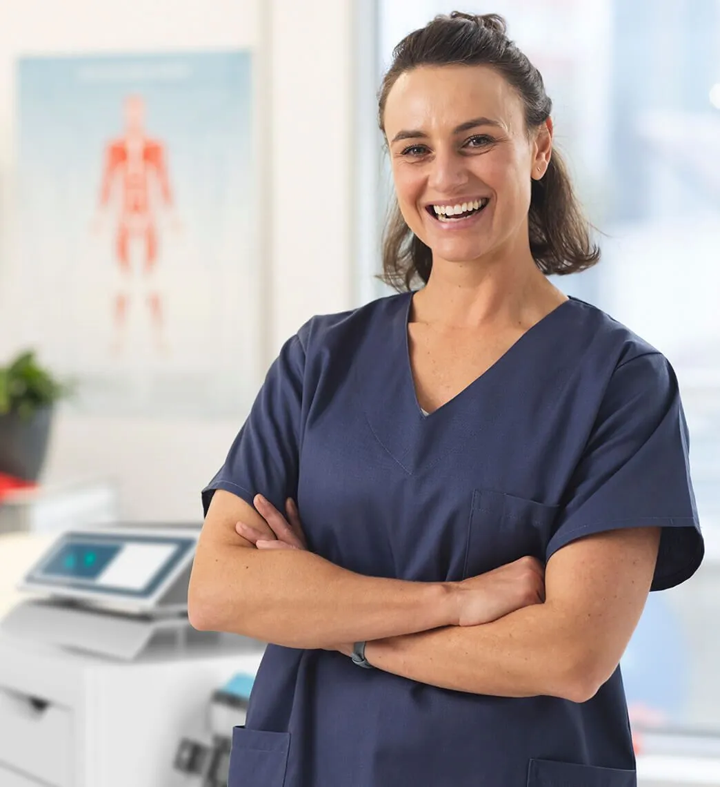 Smiling nurse in a medical office.